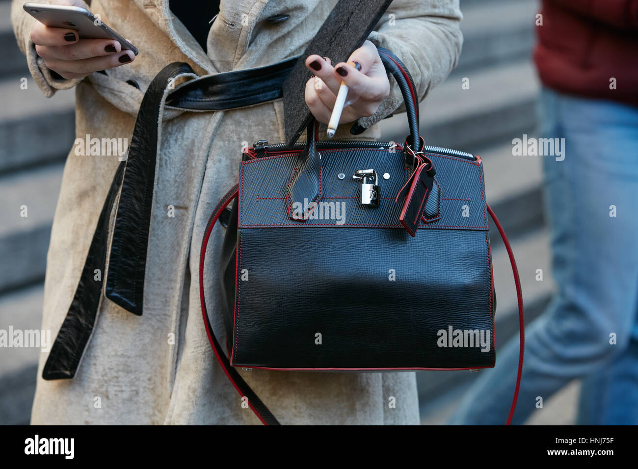 Louis vuitton bag woman hi-res stock photography and images - Alamy