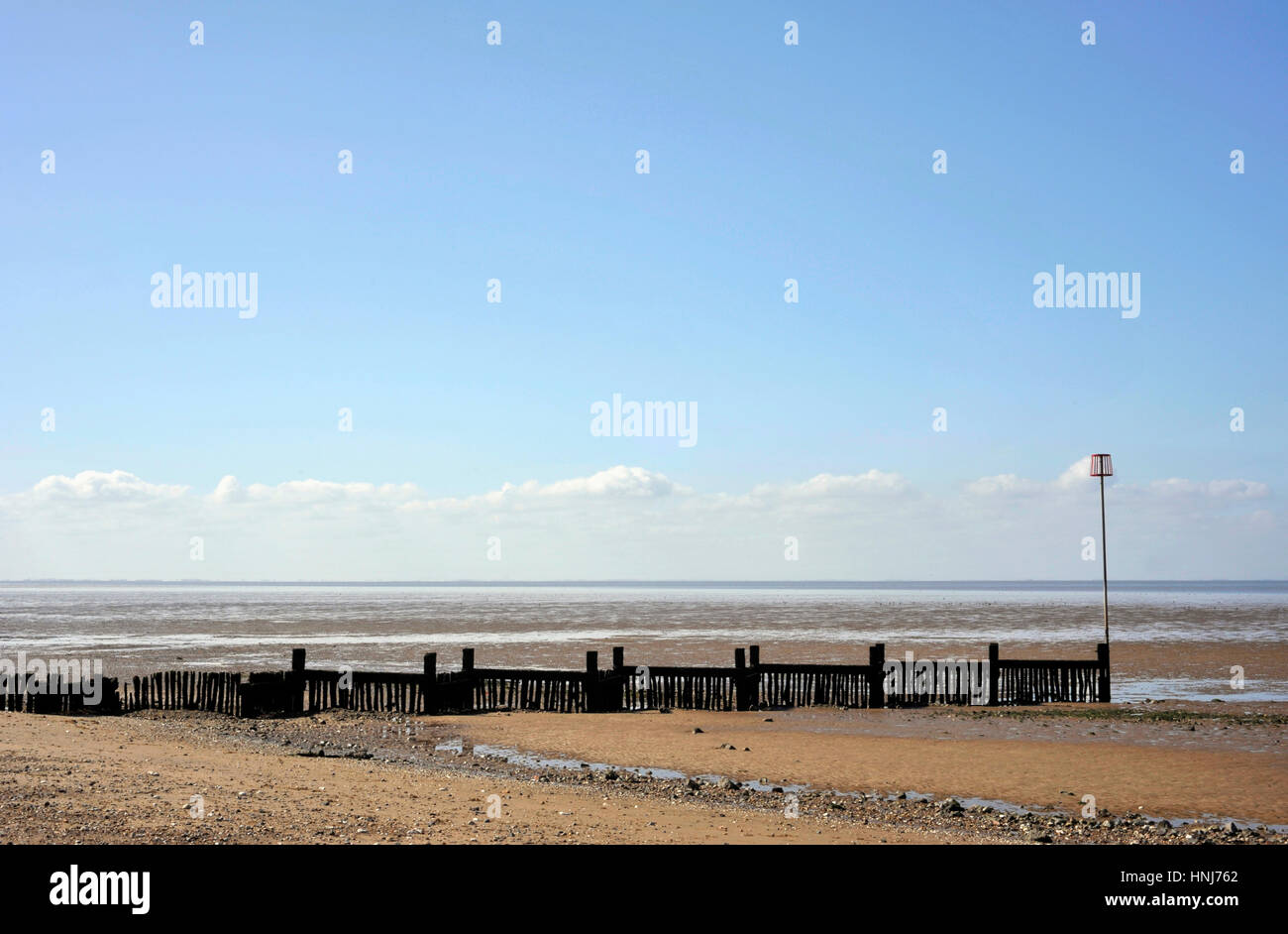 Wooden breakers on an empty beach low tide landscape at Heacham on the ...