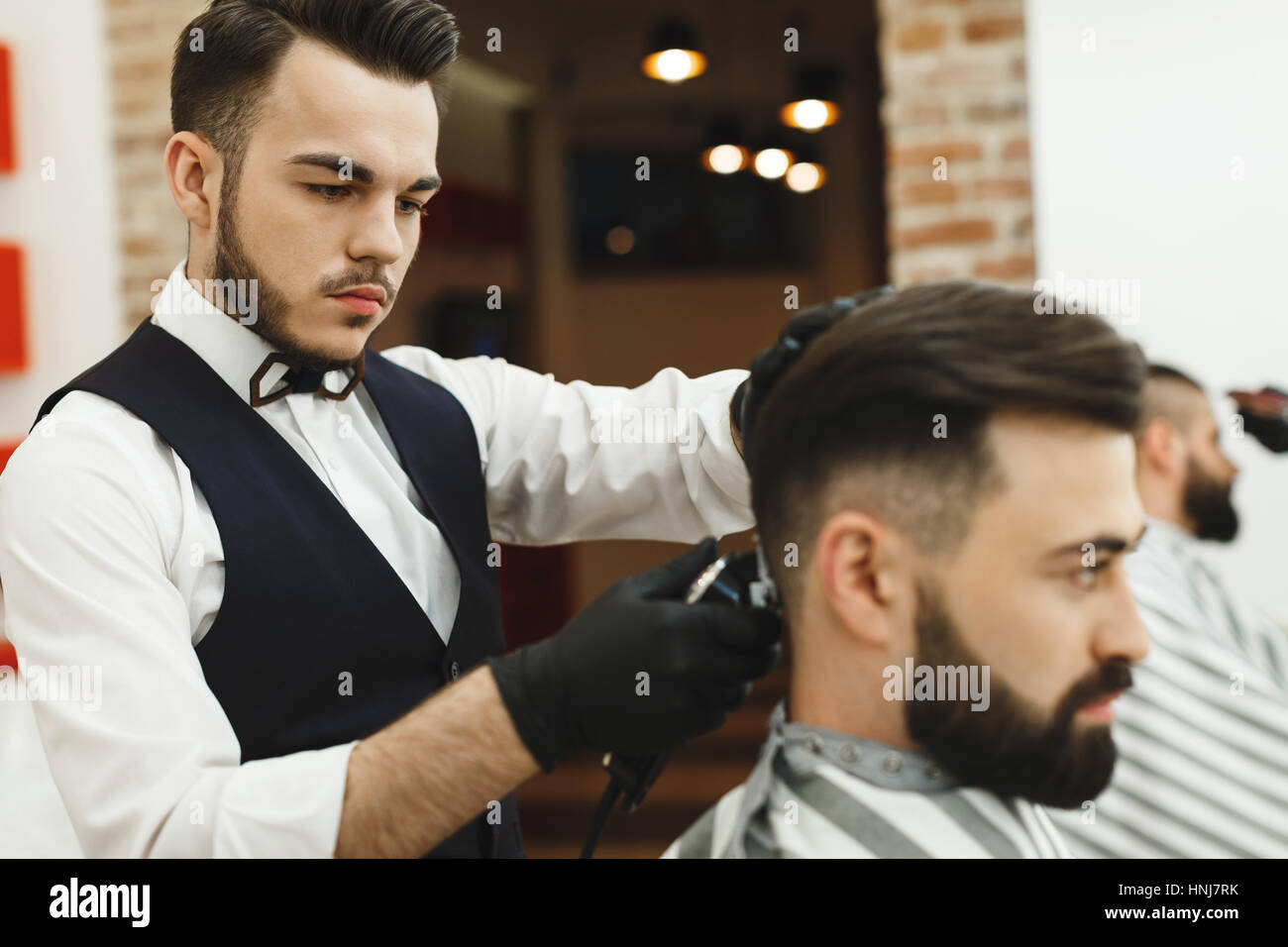 A Barber is Going through the Electric Cutting and Shaving Machine for the  Beard of an African-American Brazilian Boy Stock Image - Image of beauty,  business: 214303807