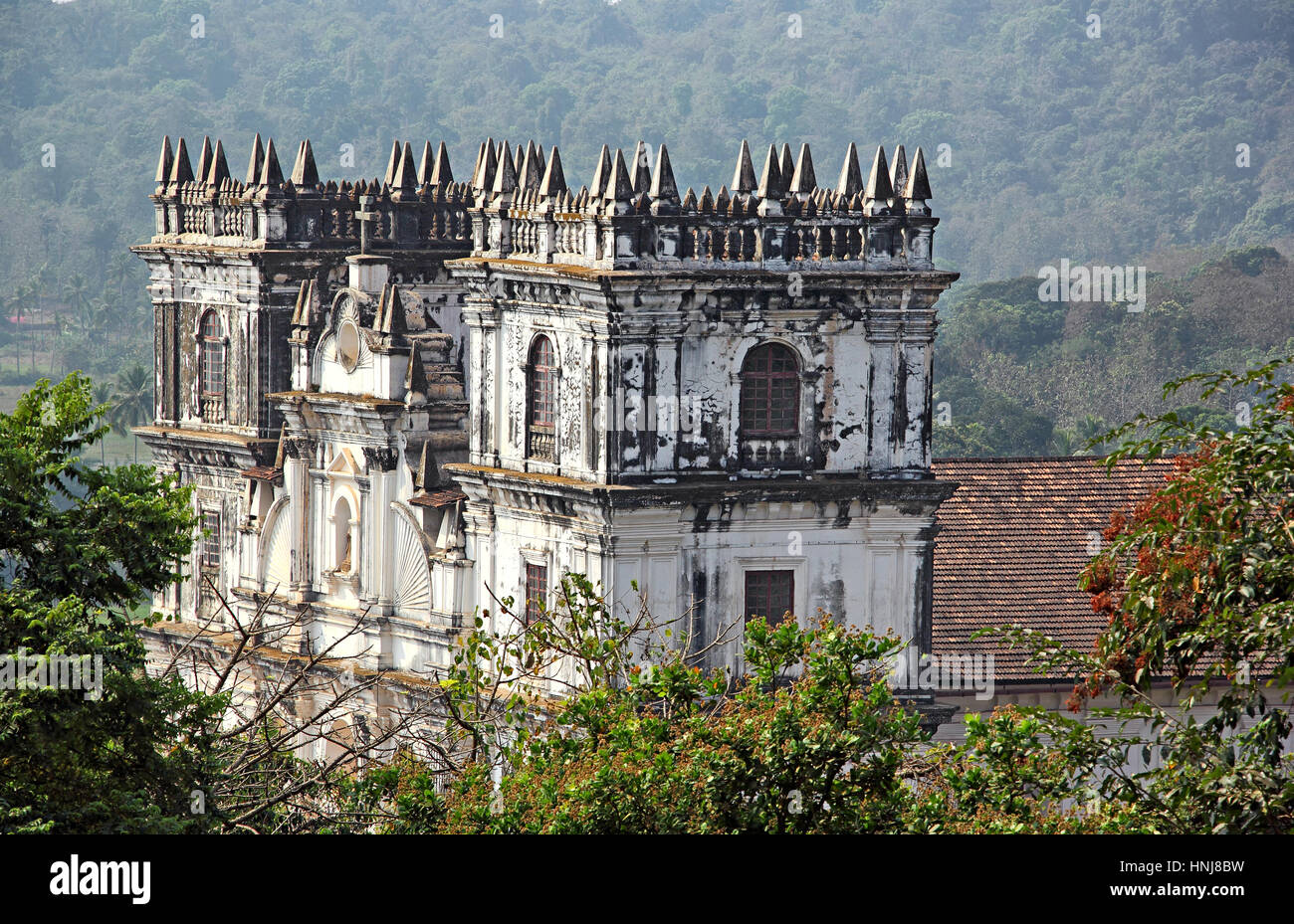 The spires of Saint Anne Church, Santana Church, a 17 th century church in Portuguese baroque style, in Talaulim, Goa, India Stock Photo