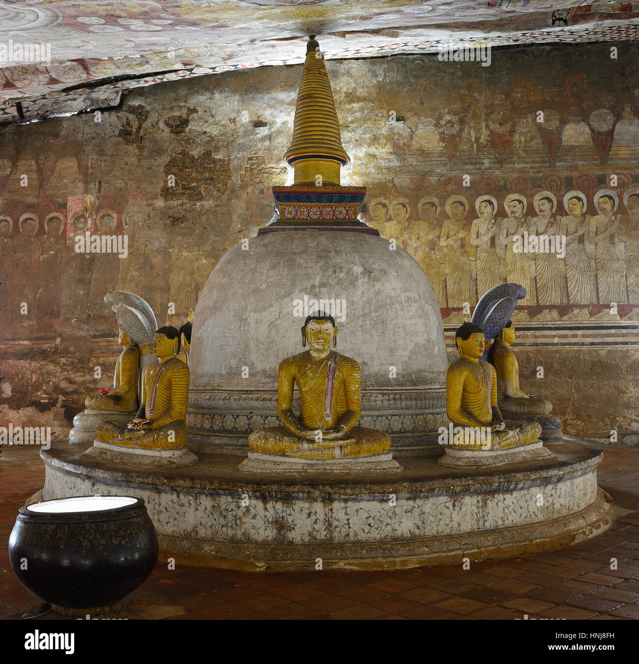 Insides of caves in ancient Buddhist complex in Dambulla cave temple. Sri Lanka. Stock Photo