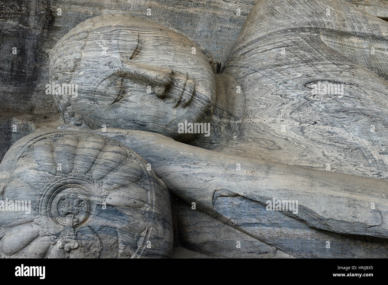 Polonnaruwa ruin was the second capital of Sri Lanka after the destruction of Polonnaruwa. The photograph is presenting  a lying Buddha sculpture at G Stock Photo