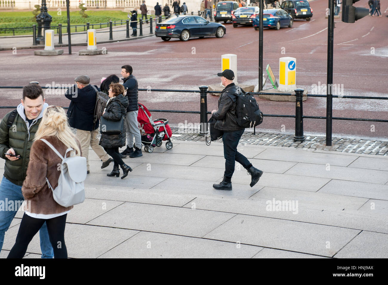 Suspicious looking man several backpacks hi-res stock photography and ...