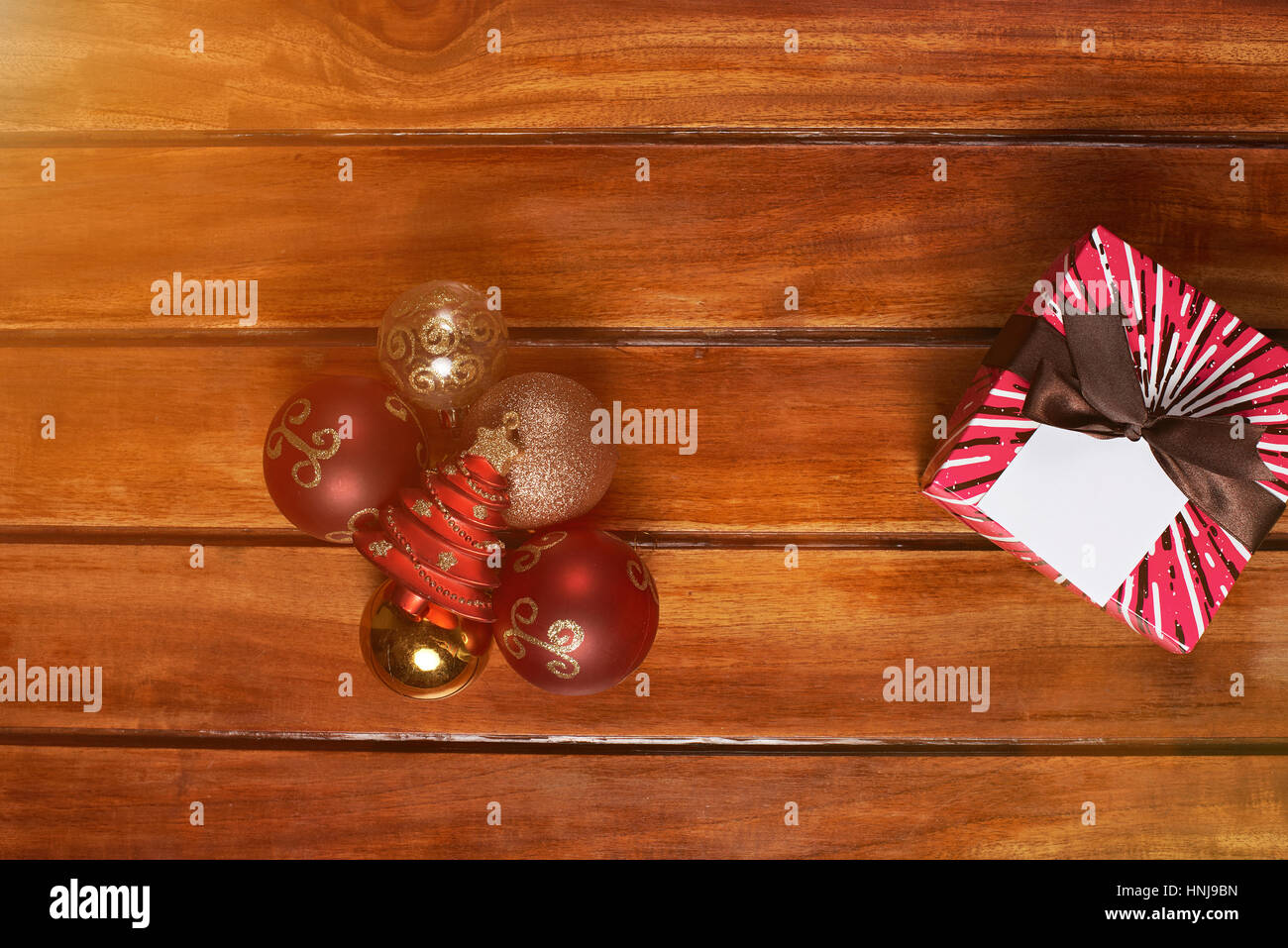 Christmas decoration on sun light with christmas present box wooden table Stock Photo
