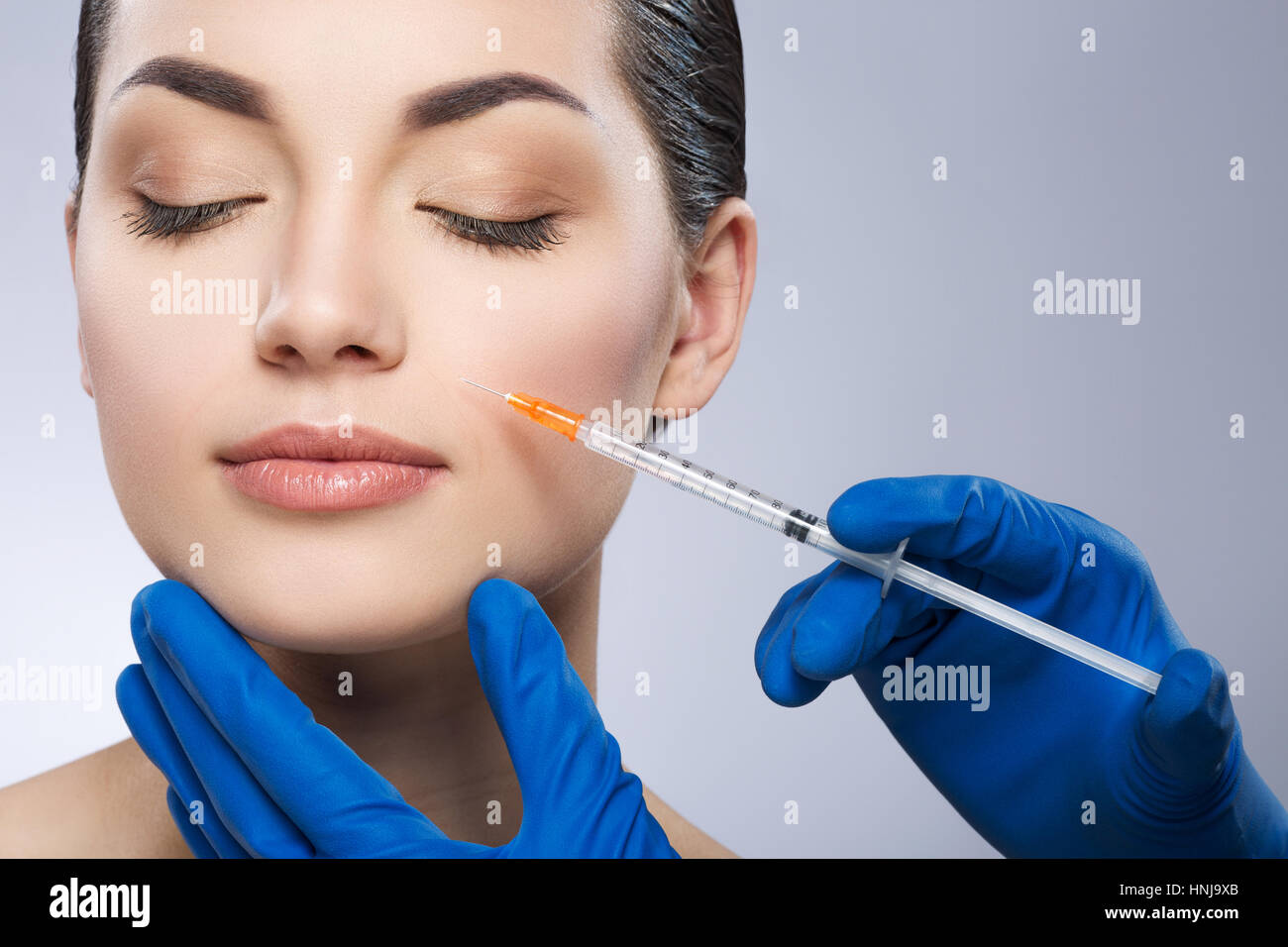 Girl operated by plastic surgeon Stock Photo Alamy