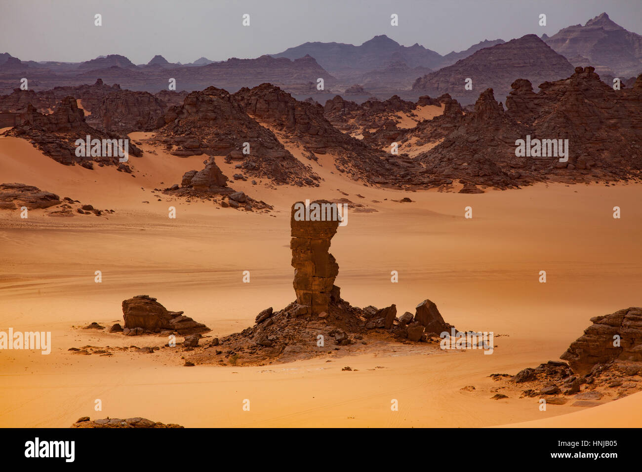 Sandstone and dunes, Jebel Acacus, LIbya, Mountains in Sahara Desert UNESCO World Heritage Site, The Awiss  Africa Stock Photo
