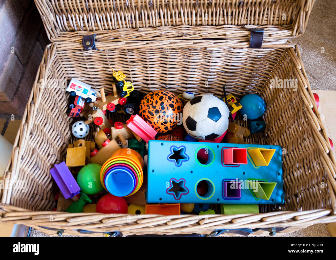 A toy box full of toys Stock Photo - Alamy
