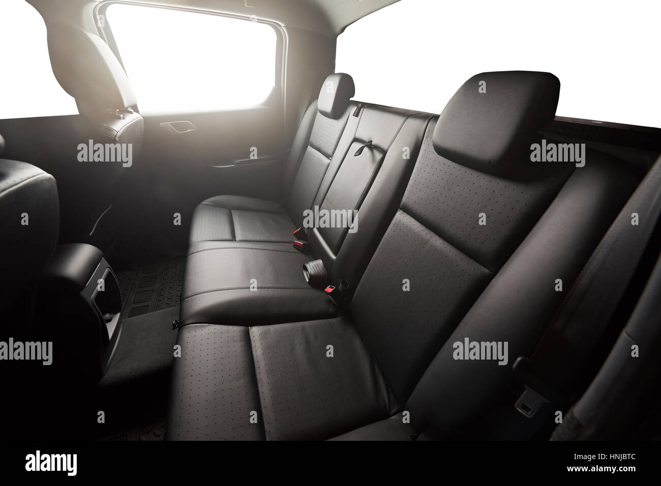 Black pickup back leather seat with isolated windows Stock Photo