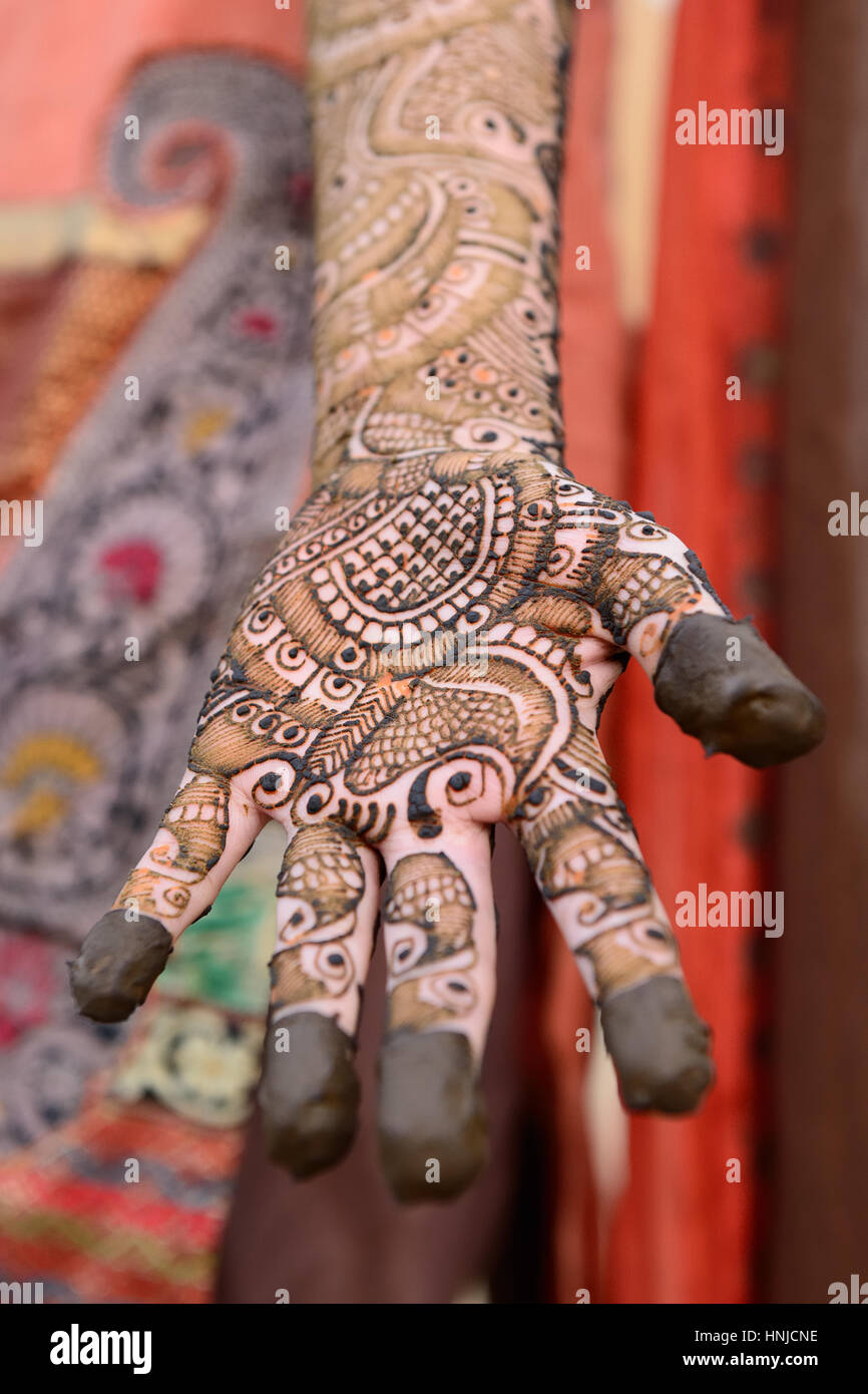 Henna on hands of women from India Stock Photo