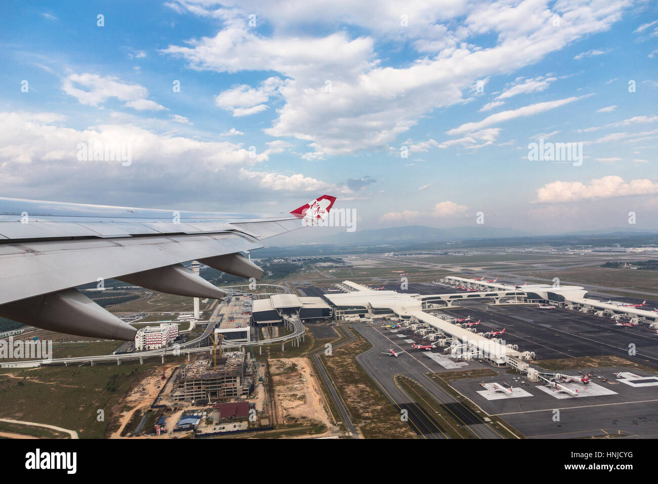 KUALA LUMPUR, MALAYSIA - MARCH 1 2016: An Air Asia X plane takes off from KLIA2 airport in Kuala Lumpur. This is a major low cost carrier in Asia. Stock Photo