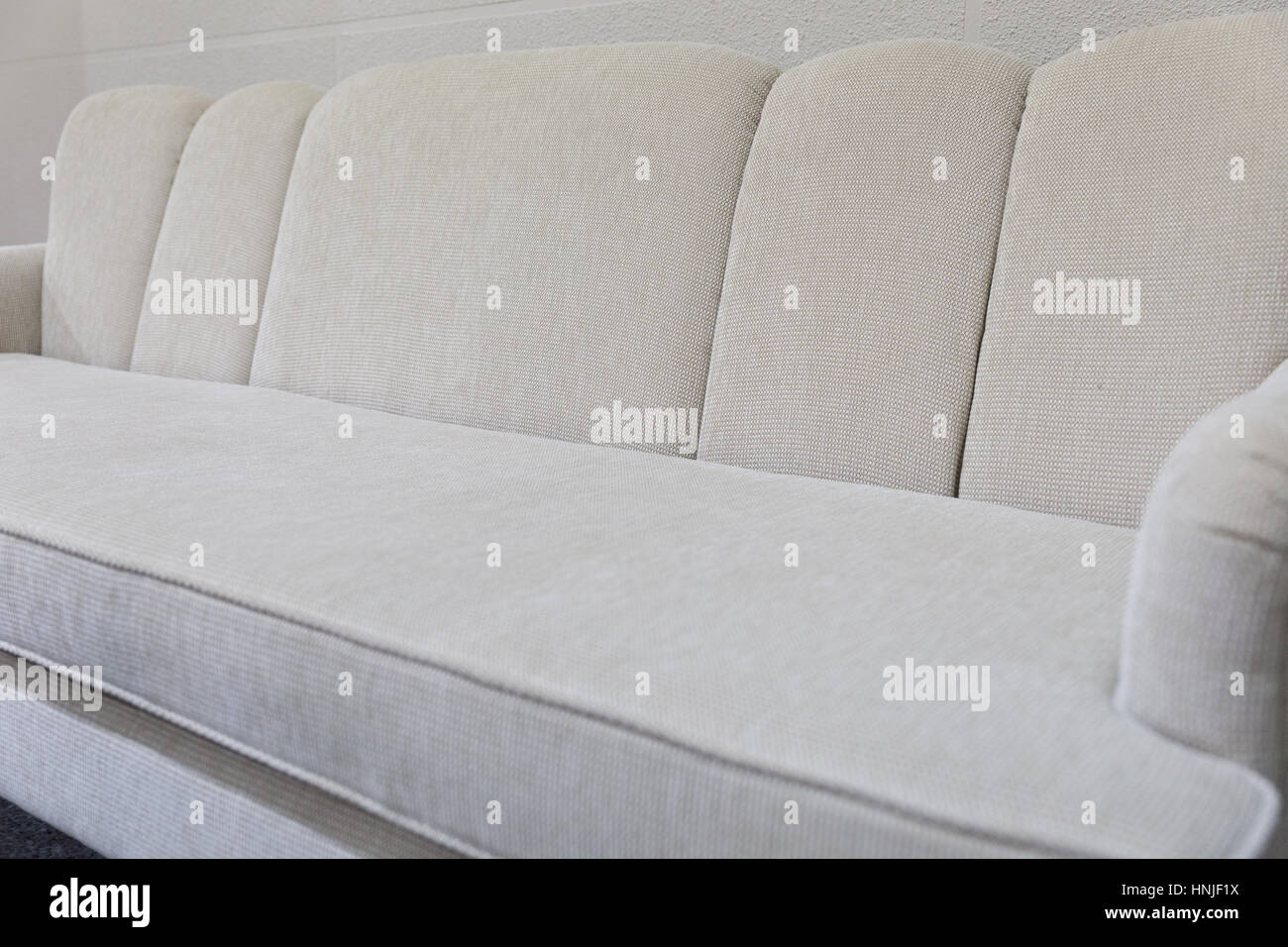 beige fabric sofa couch living room Stock Photo Alamy