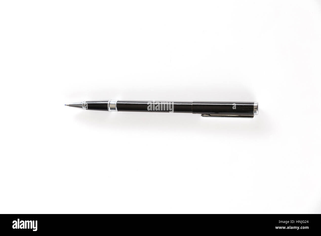 black ballpoint pen on white background Stock Photo Alamy
