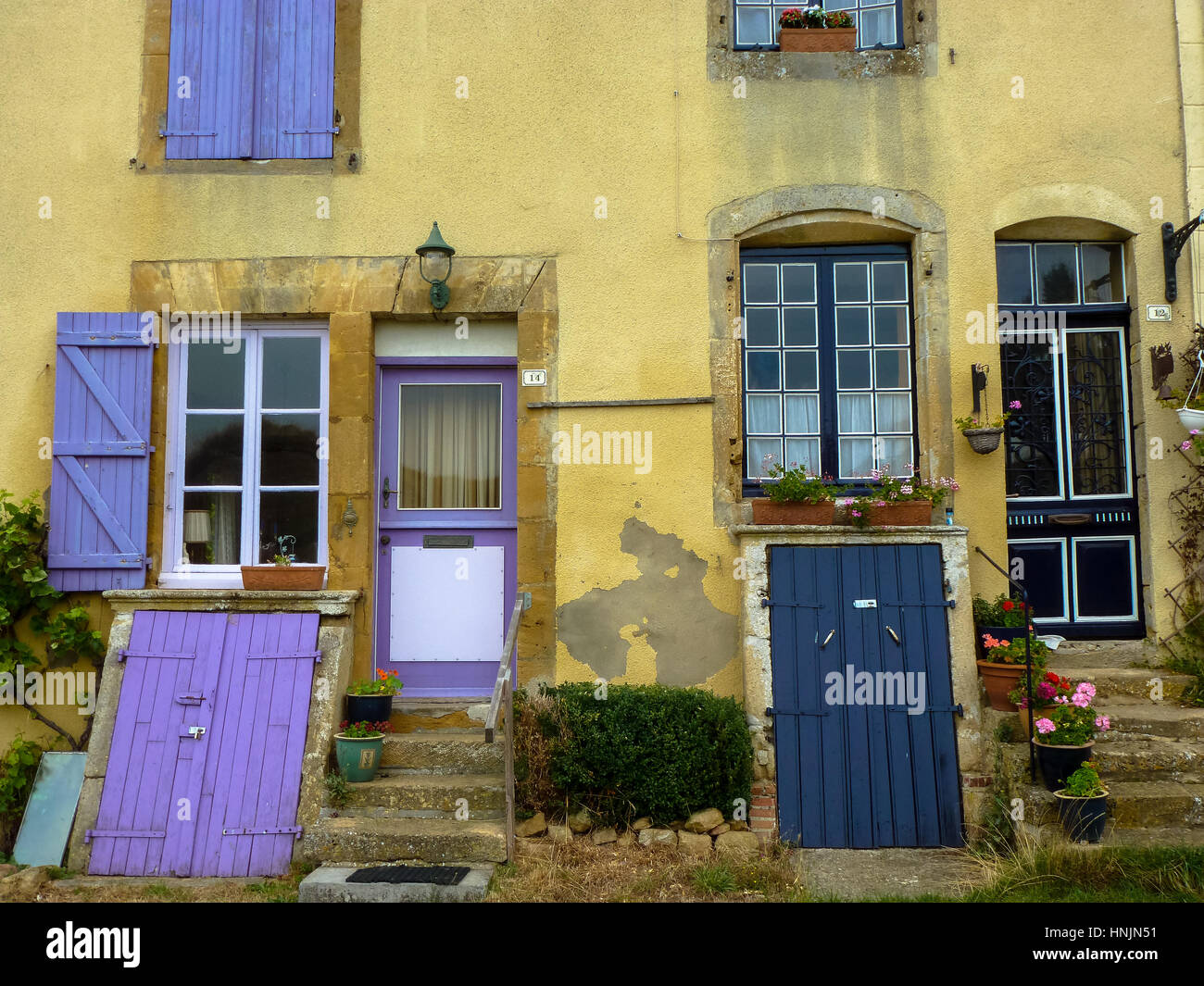 houses with colorful wooden window shutters at haut malmedy france Stock Photo