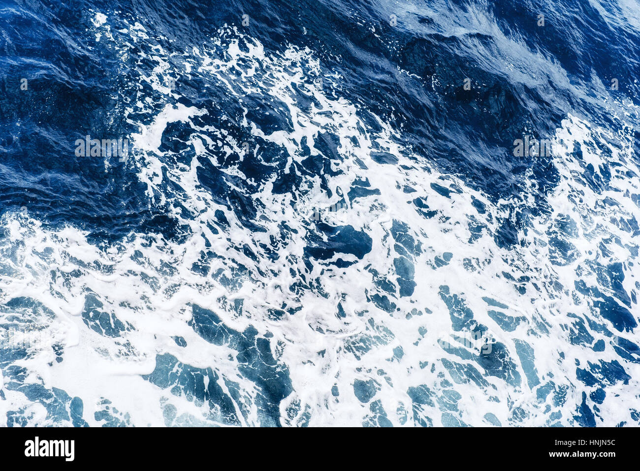 Background blue waves of the sea. Beauty world Stock Photo - Alamy