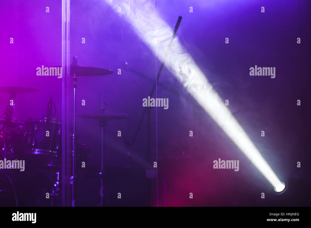 Ray of scenic spot light over blurred csenic background, stage illumination equipment Stock Photo