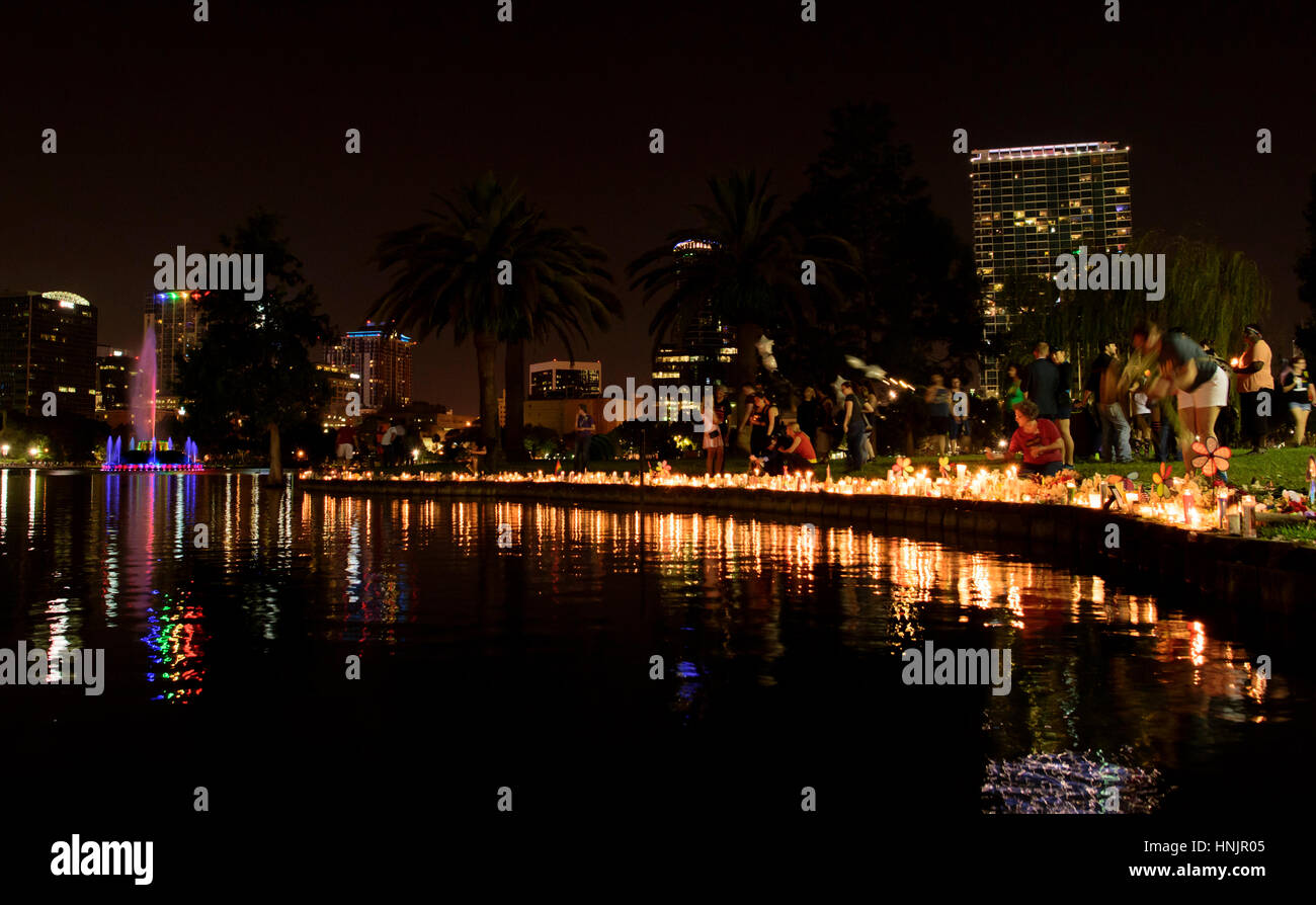 A Candlelight Vigil honored the victims of the Pulse nightclub shooting at Lake Eola Park in Orlando, Florida on June 19, 2016. Stock Photo