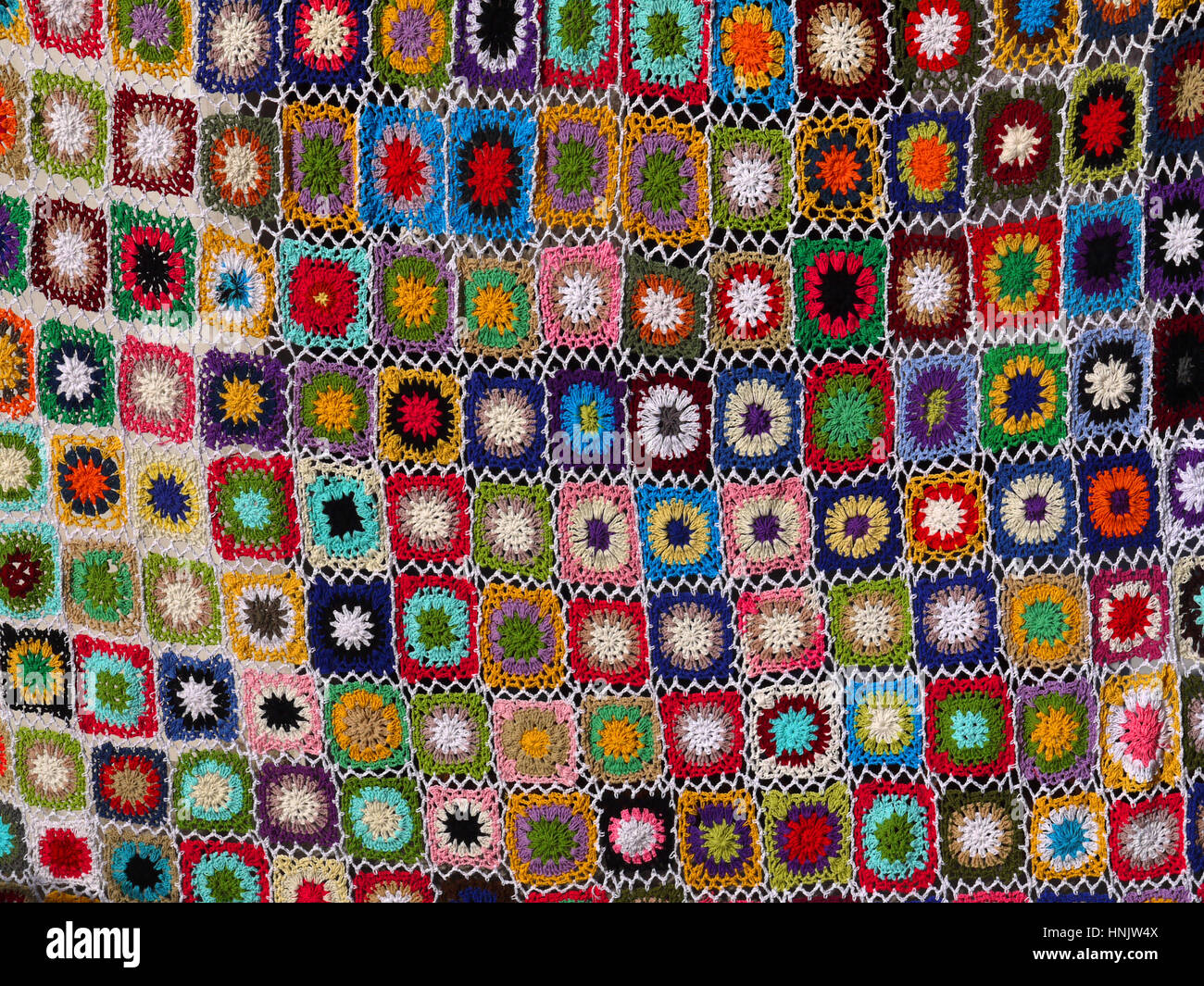 Colorful crocheted bedspread, Indonesia Stock Photo