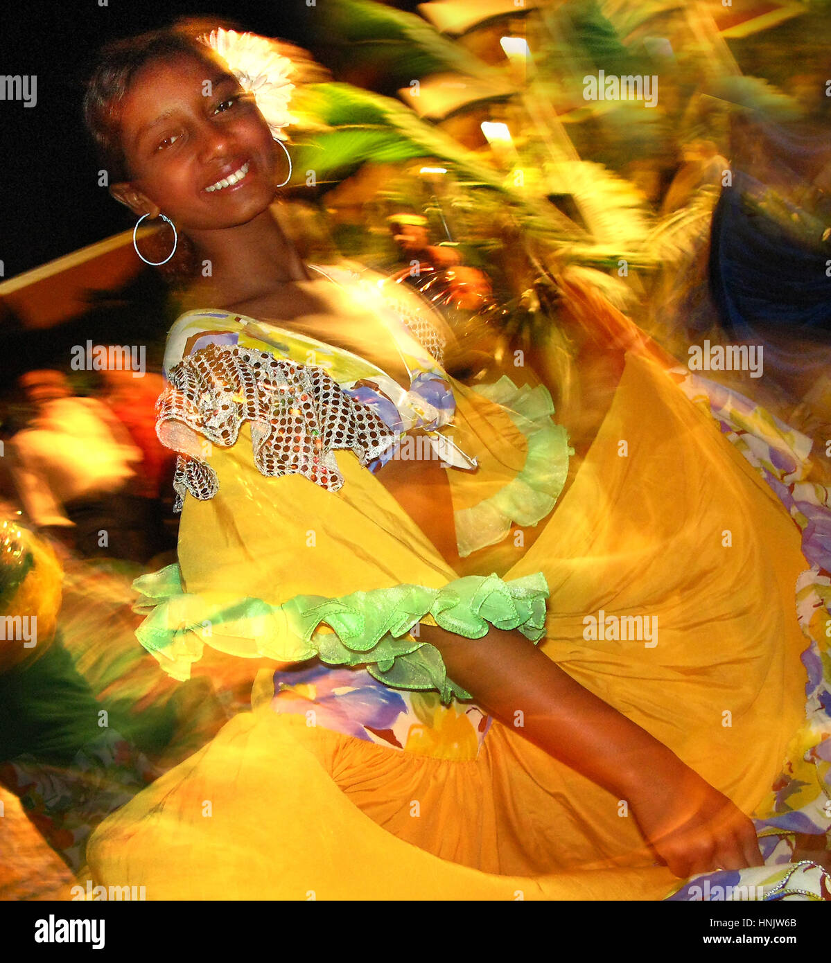 Sega dancer during the International Festival Creole, colorful dresses, yellow dress, dance movement, fun, Mauritius, Sega dancer, International Creol Stock Photo