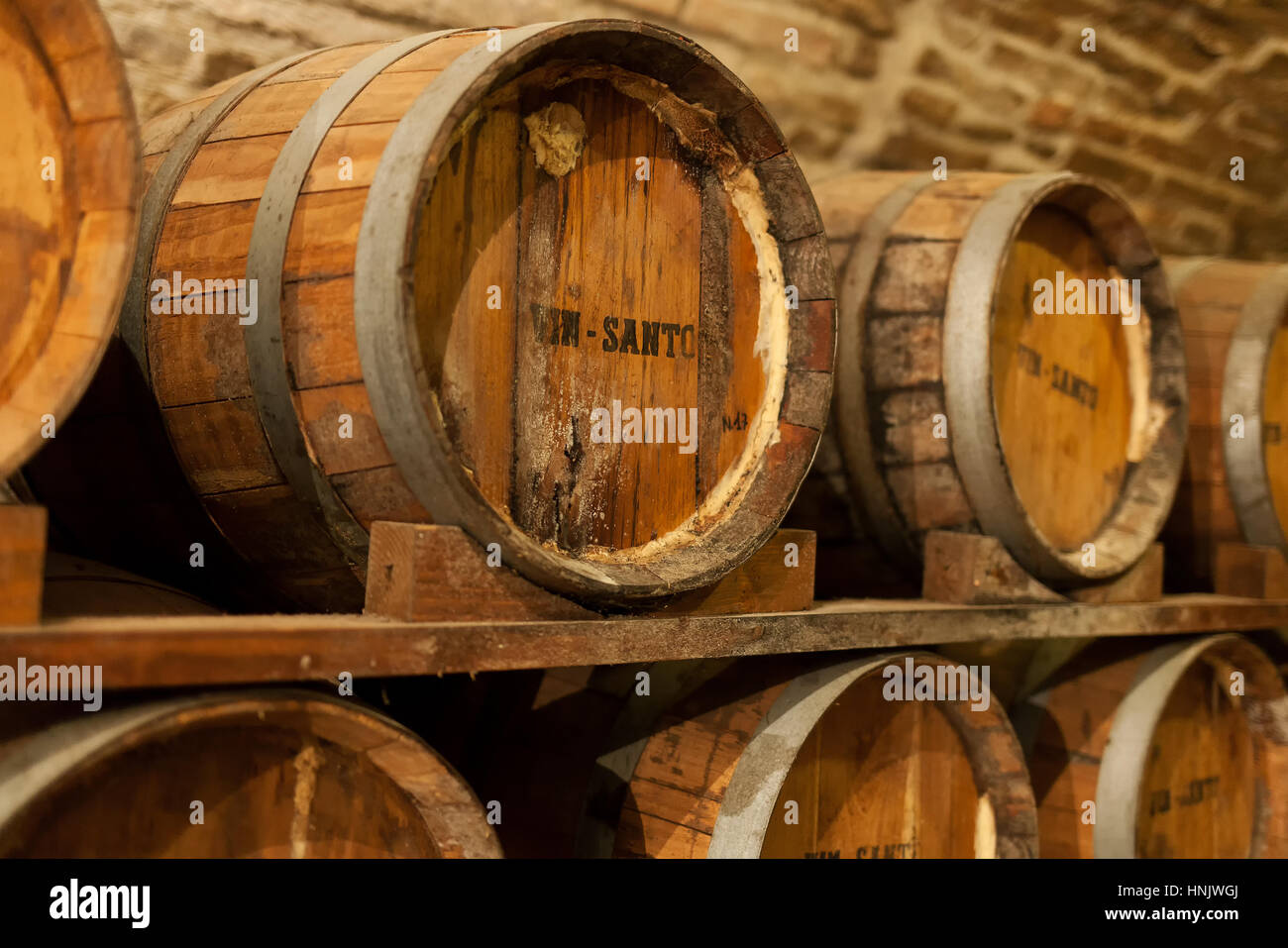 Barrels of Vin Santo (dessert wine) inside a winery in Montepulciano