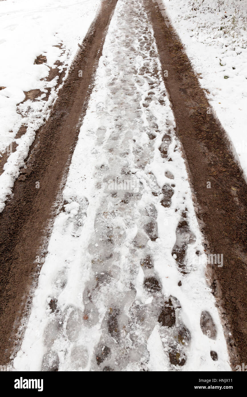 traces of the car on snow Stock Photo - Alamy