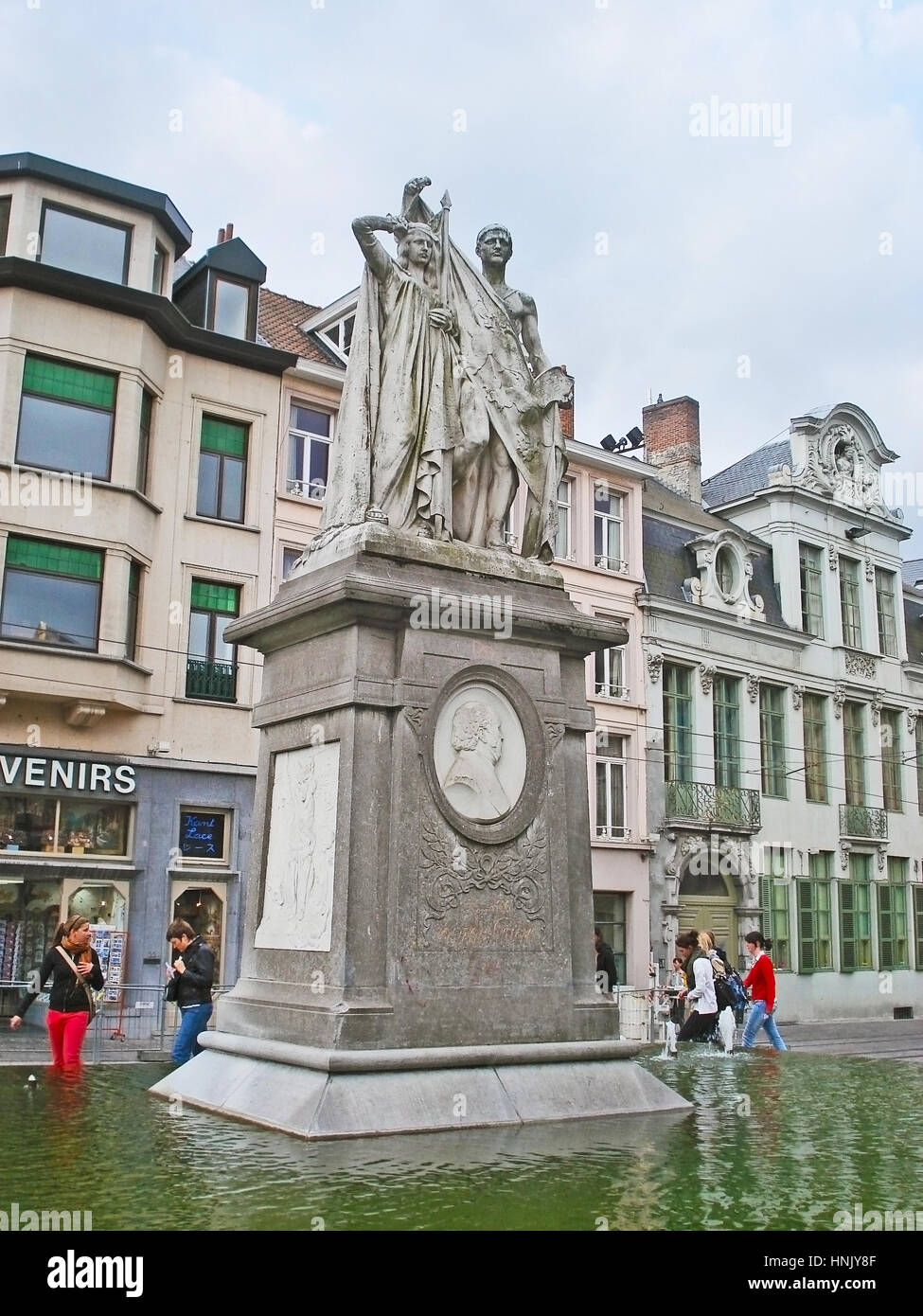 GHENT, BELGIUM - MAY 26, 2011: The monument to Jan Frans Willems surrounded by fountain and located at Sint-Baafsplein Square, on May 26 in Ghent. Stock Photo