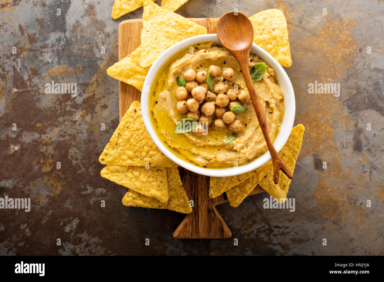 Homemade hummus with tortilla chips overhead shot Stock Photo Alamy