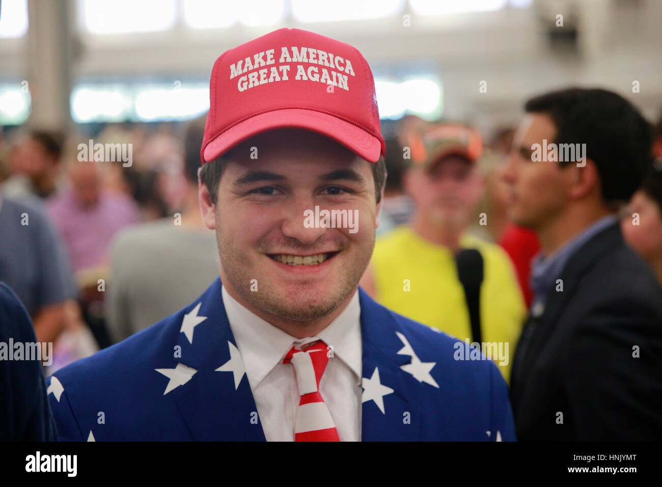 A Trump supporter wears a hat reading, 'Make America Great Again,' before the presidential campaign rally for Donald Trump at the Indiana State Fairgrounds during the Indiana primary in 2016. Donald Trump went on to win the Indiana primary, and the presidency. Stock Photo