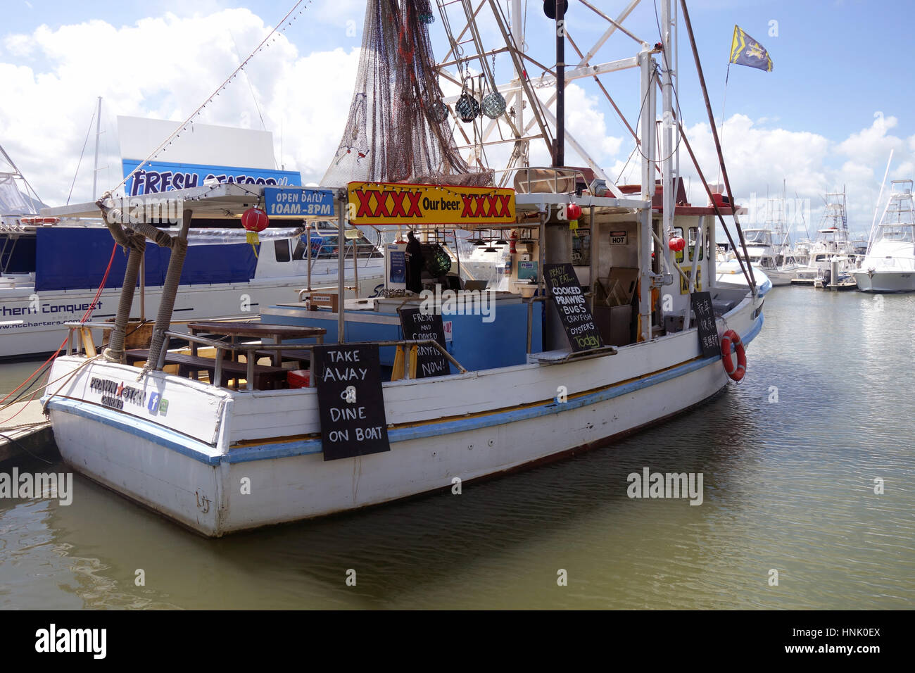 Prawn Star, a trawler boat restaurant offering fresh seafood, Cairns marina, Queensland, Australia. No PR Stock Photo