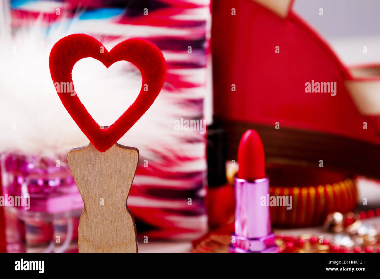 Fabric heart on wooden stand. Stock Photo