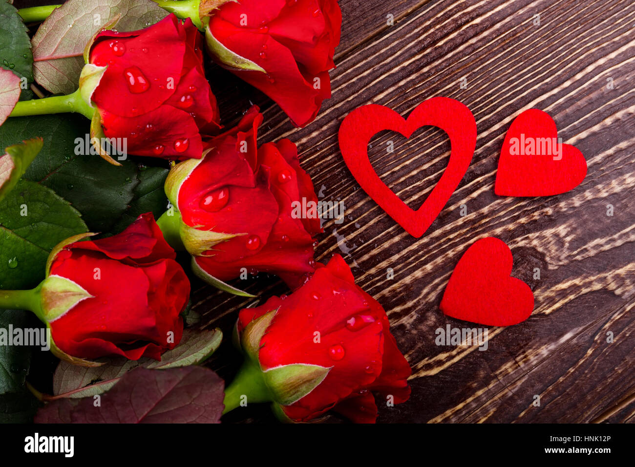 Hearts and water dropped roses Stock Photo - Alamy