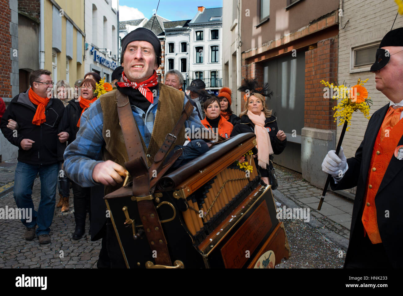 Music, dance, party and costumes in Binche Carnival. Ancient and representative cultural event of Wallonia, Belgium. Stock Photo