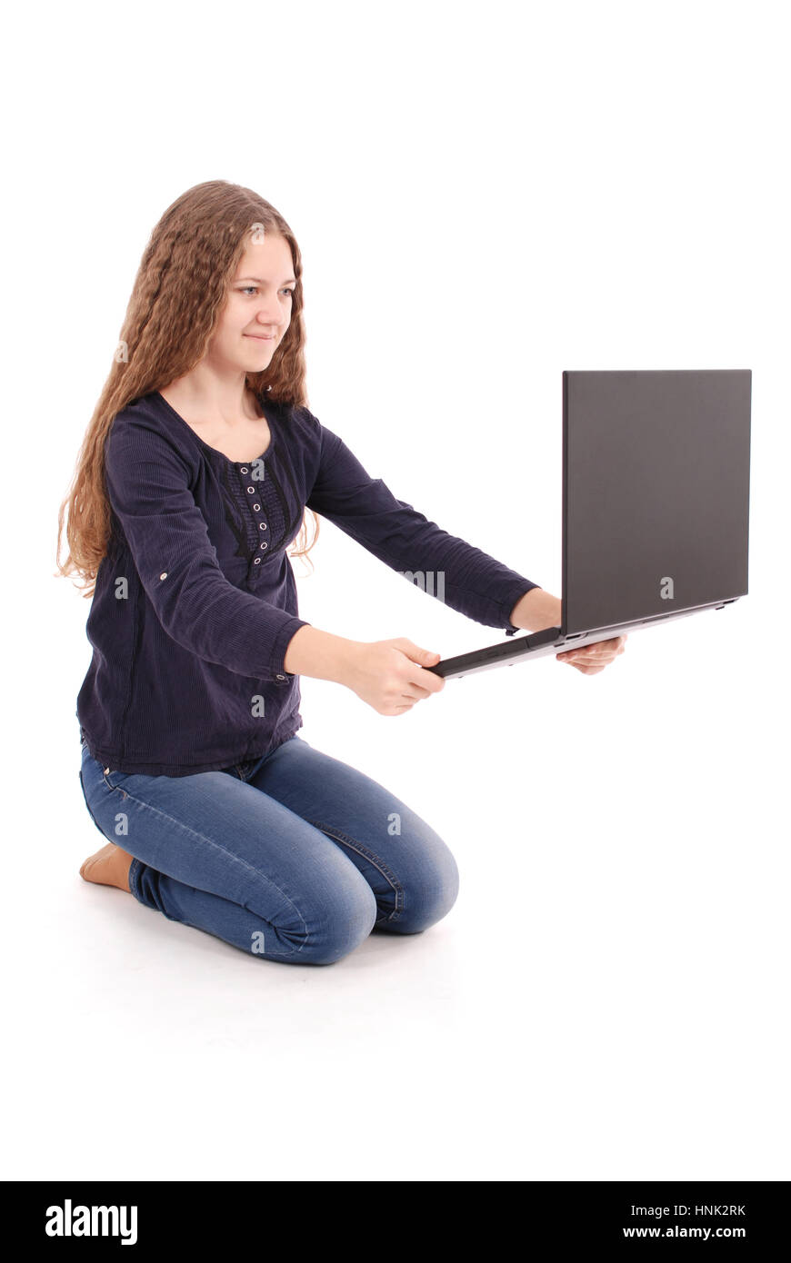 Smiling student teenage girl with laptop isolated on white Stock Photo ...