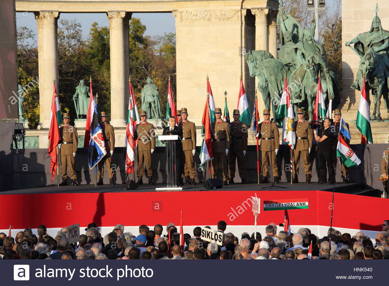 Hungarian soldiers at a military display at Heroes Square in Budapest as Viktor Orban addresses the crowd. Stock Photo