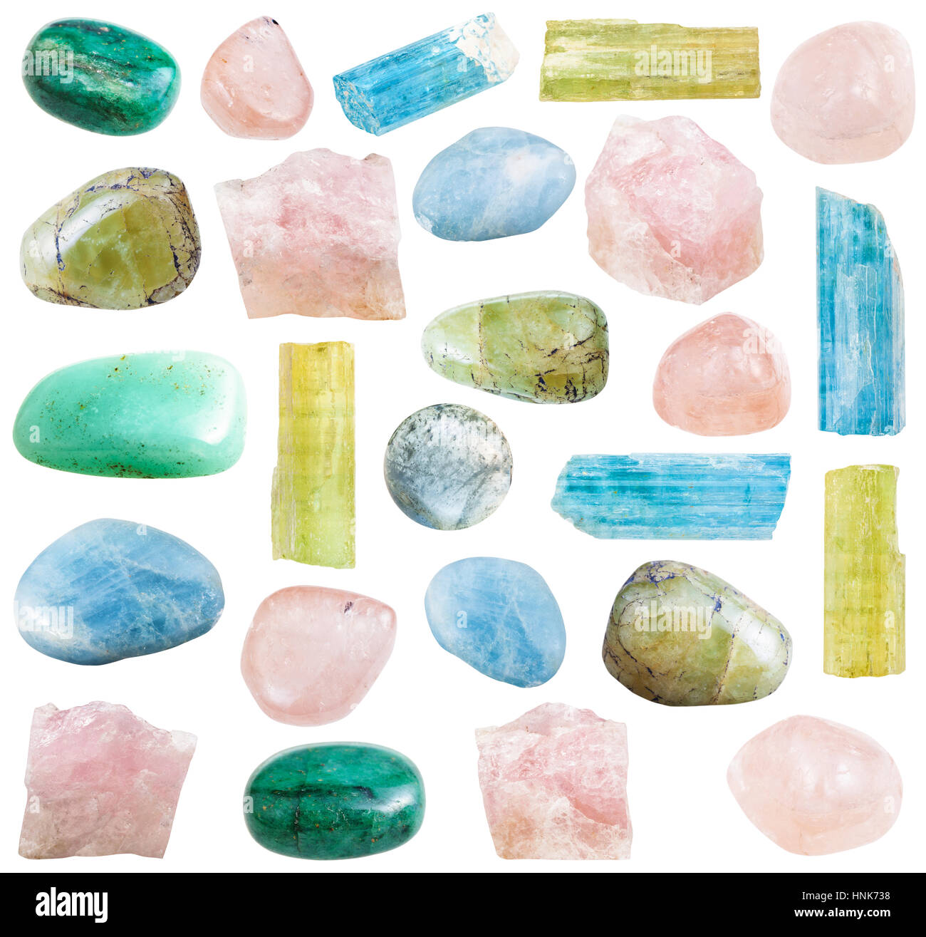 collection of tumbled and cristalline beryl mineral gemstones isolated