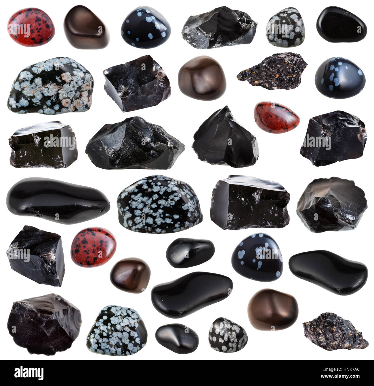 collection of various tumbled and raw obsidian volcanic glass