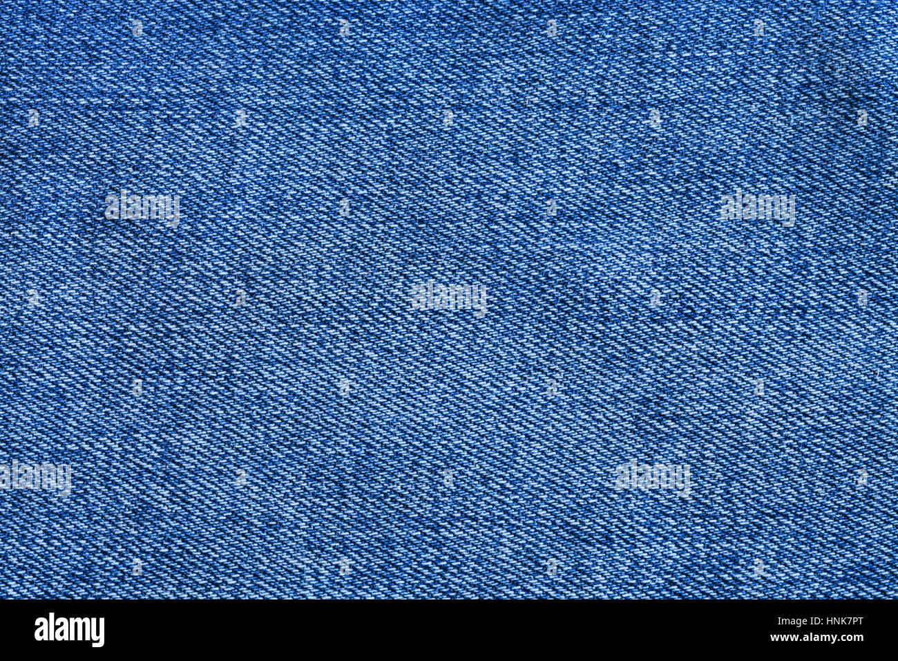 textile background - blue texture of denim fabric close up Stock Photo ...