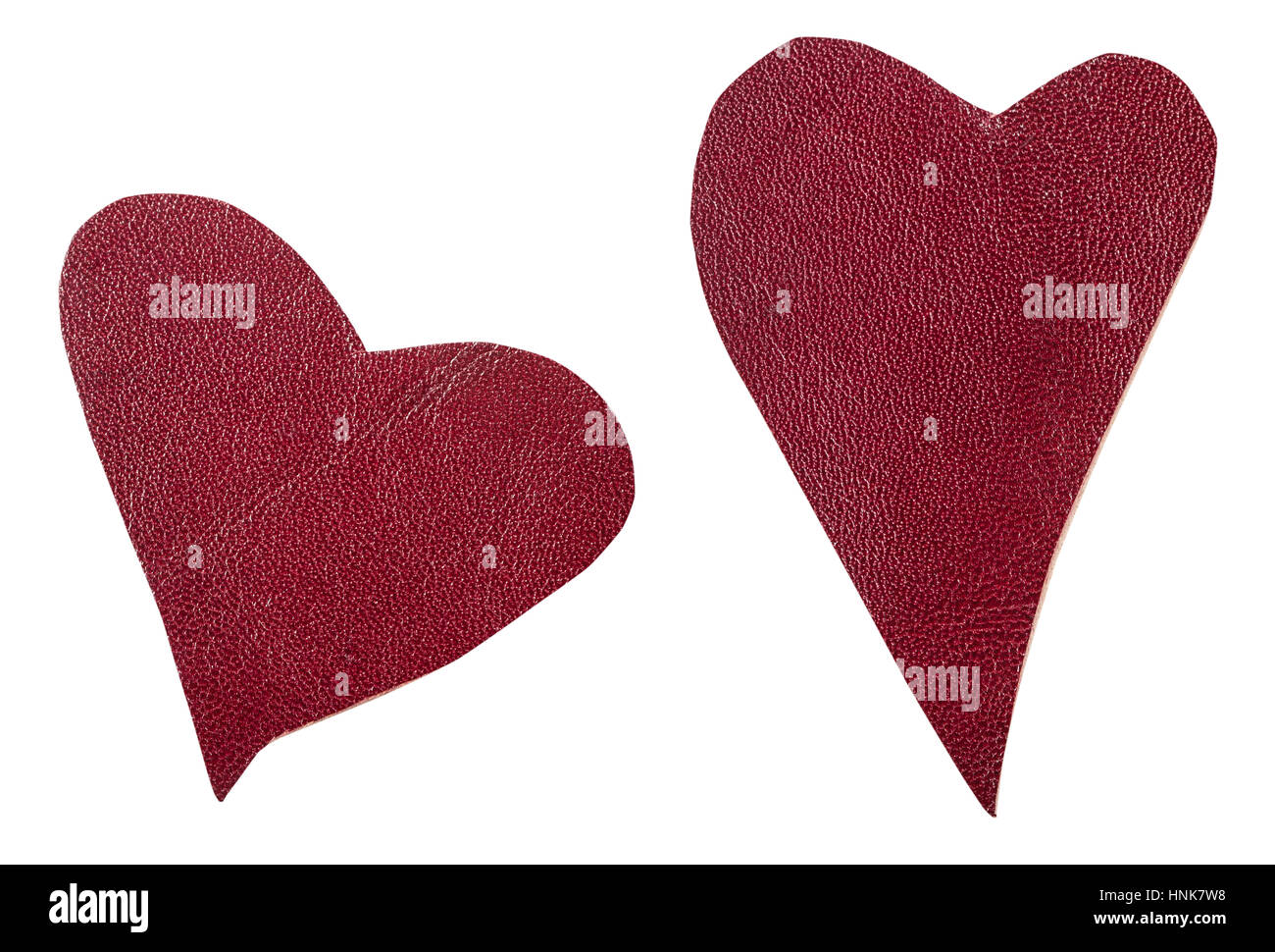 two red leather hearts isolated on white background Stock Photo