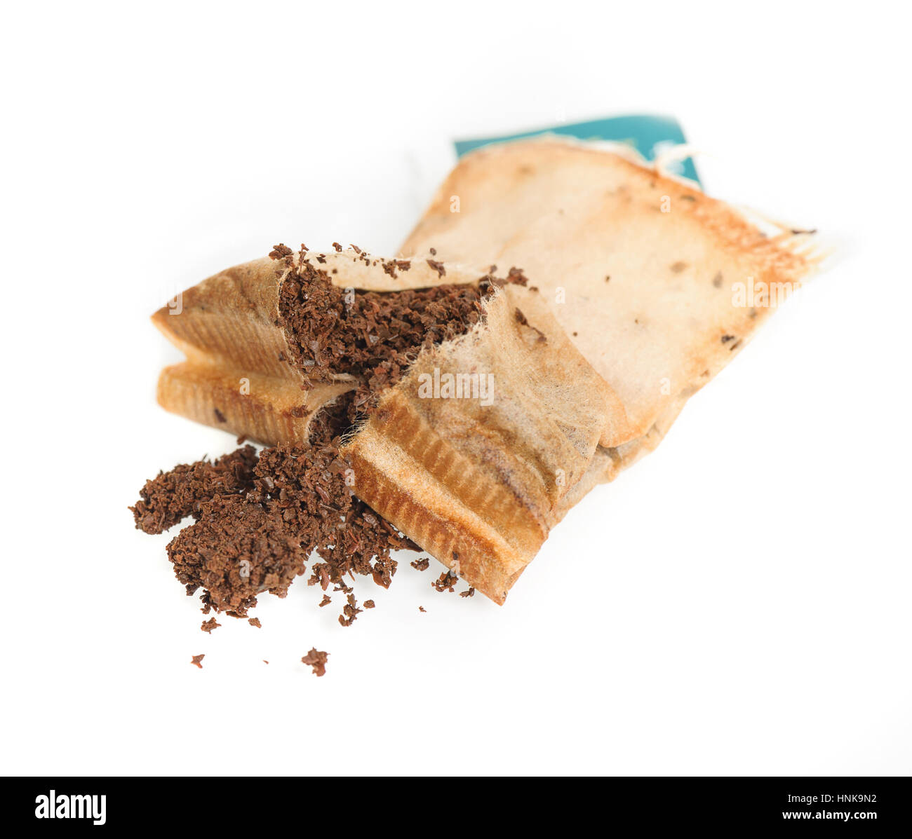 tea leaves inside the used tea bag on white background Stock Photo Alamy