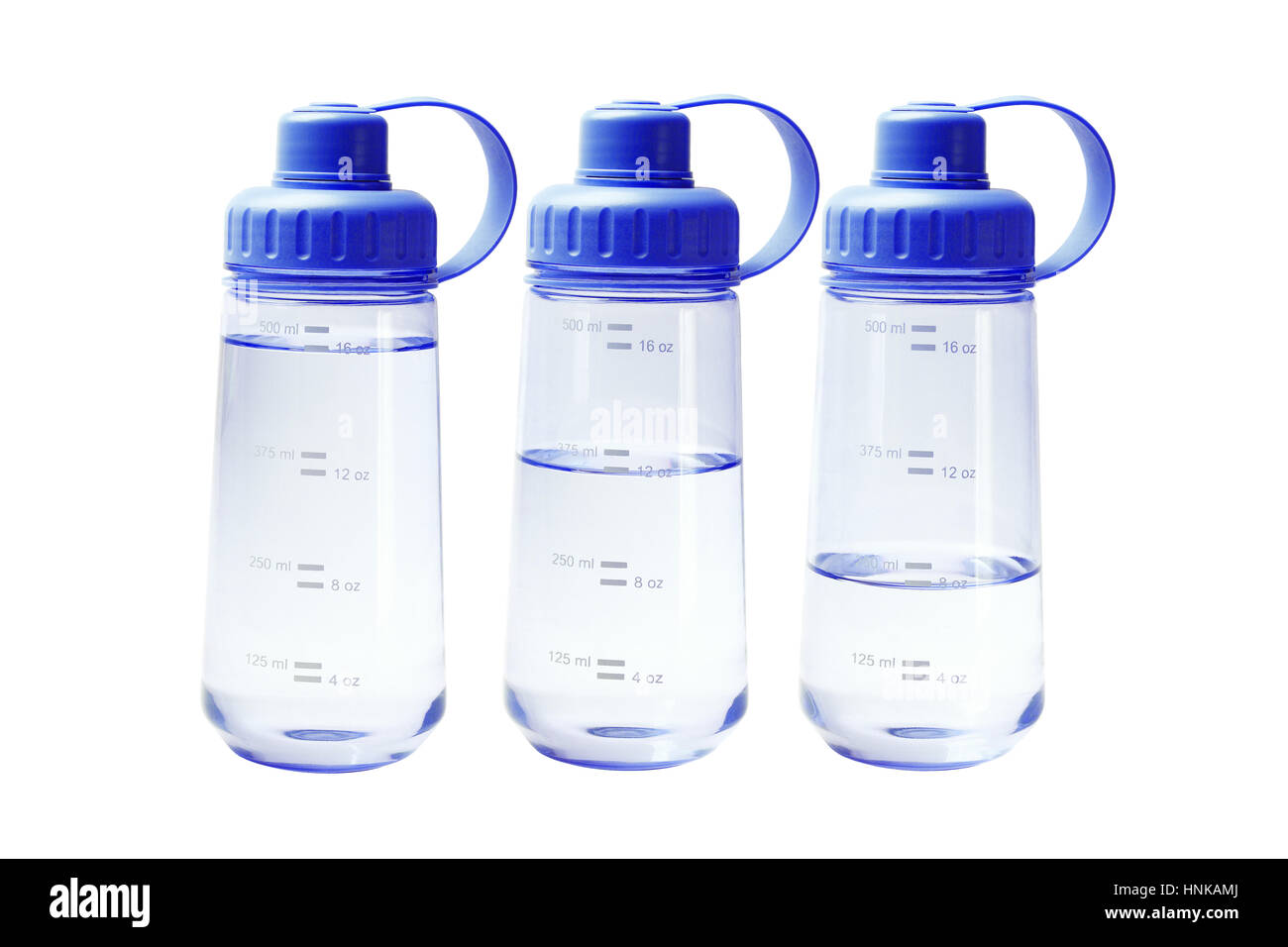 Different Water Levels in Blue Plastic Water Containers Stock Photo