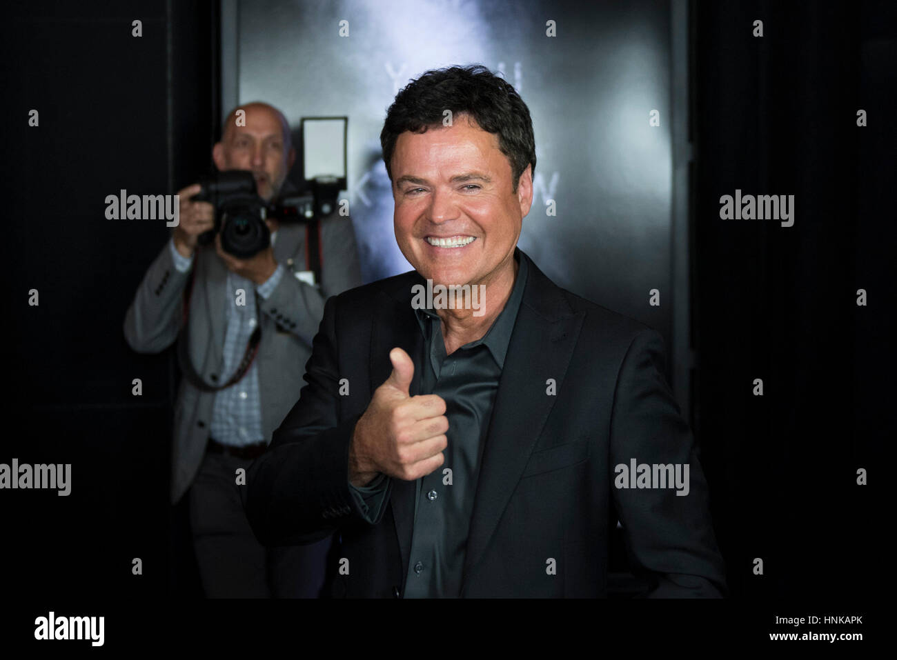 Donny Osmond poses on the red carpet ahead of the Las Vegas premiere for the film Jason Bourne at Caesars Palace hotel-casino Monday, July 18, 2016. Stock Photo