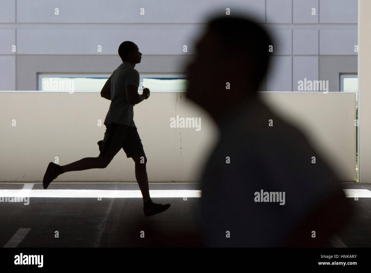 Participants run during a recruiting boot camp at Las Vegas police headquarters, June 25, 2016. Stock Photo