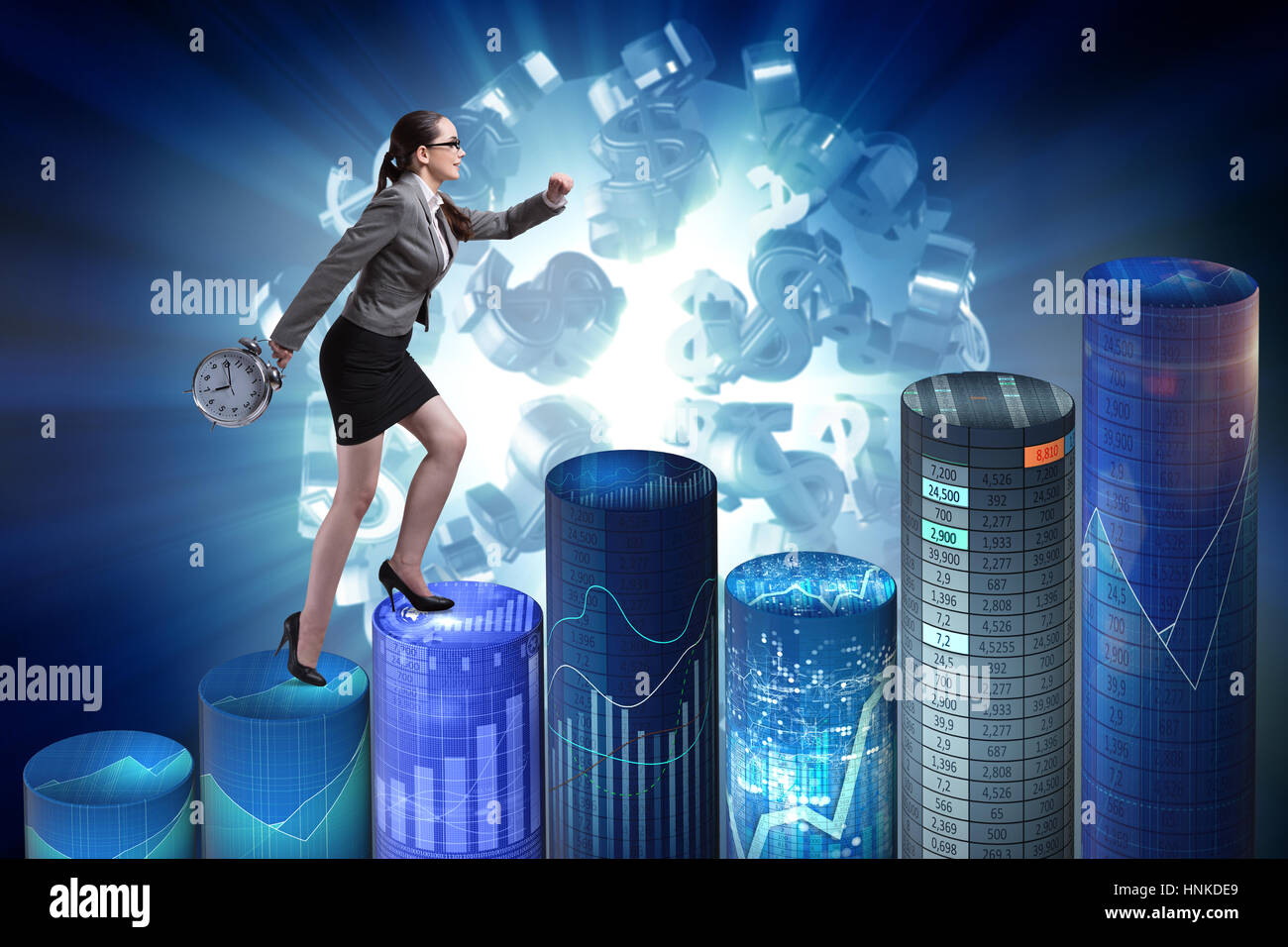 Businesswoman rushing with clock on bar charts Stock Photo - Alamy