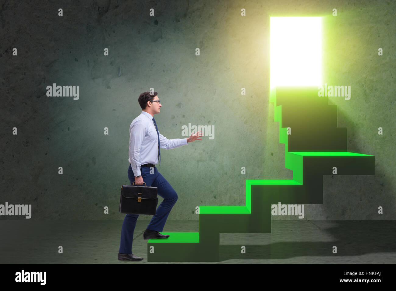 Young businessman climbing career ladder Stock Photo - Alamy