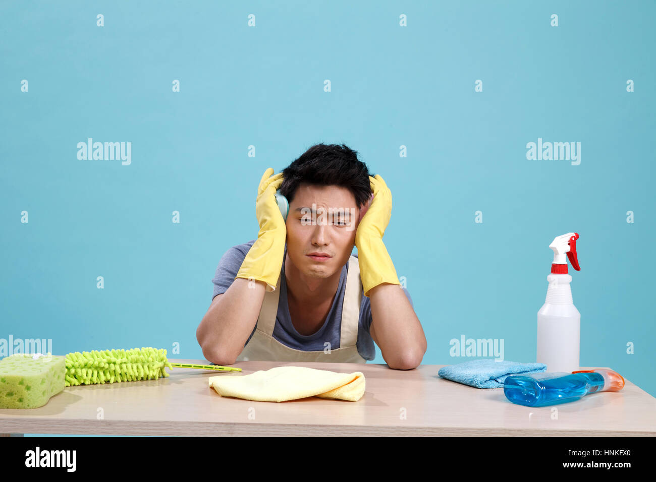 Young men do housework Stock Photo Alamy