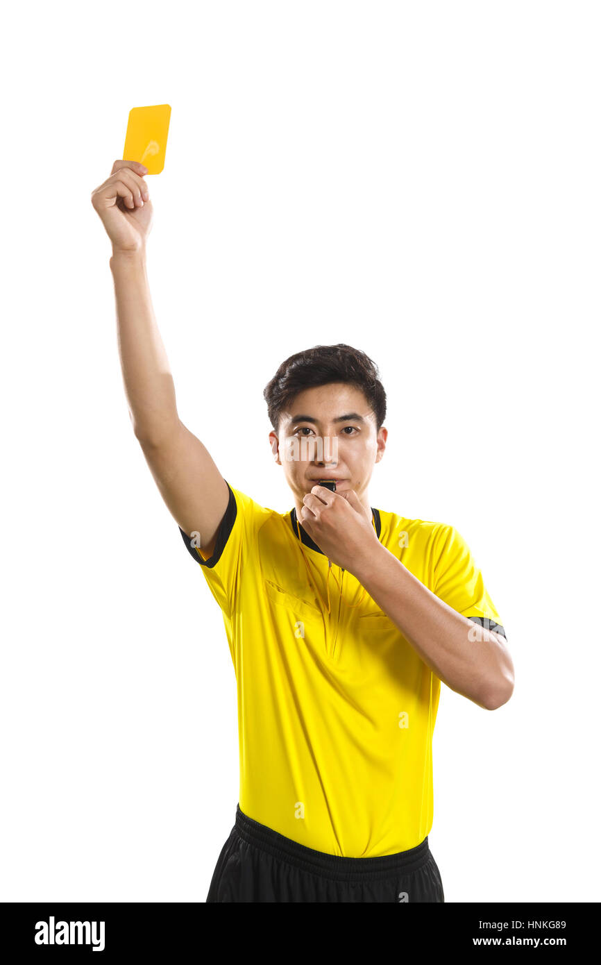Football referees show a yellow card Stock Photo Alamy