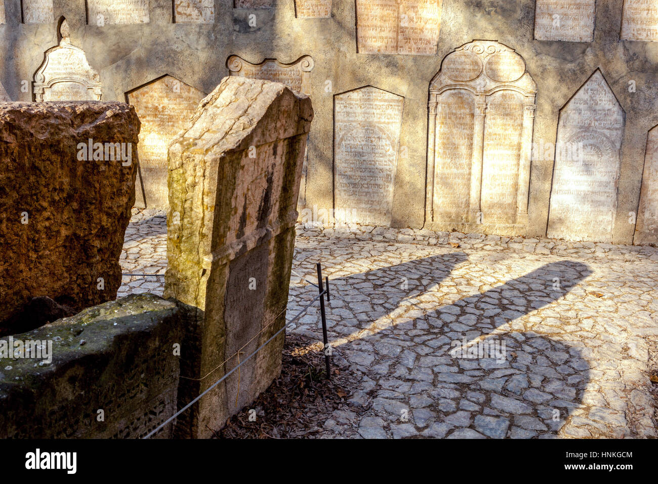Tombstone, Prague Jewish cemetery, Prague Jewish Quarter, Prague Old Town shadows atmosphere Stock Photo