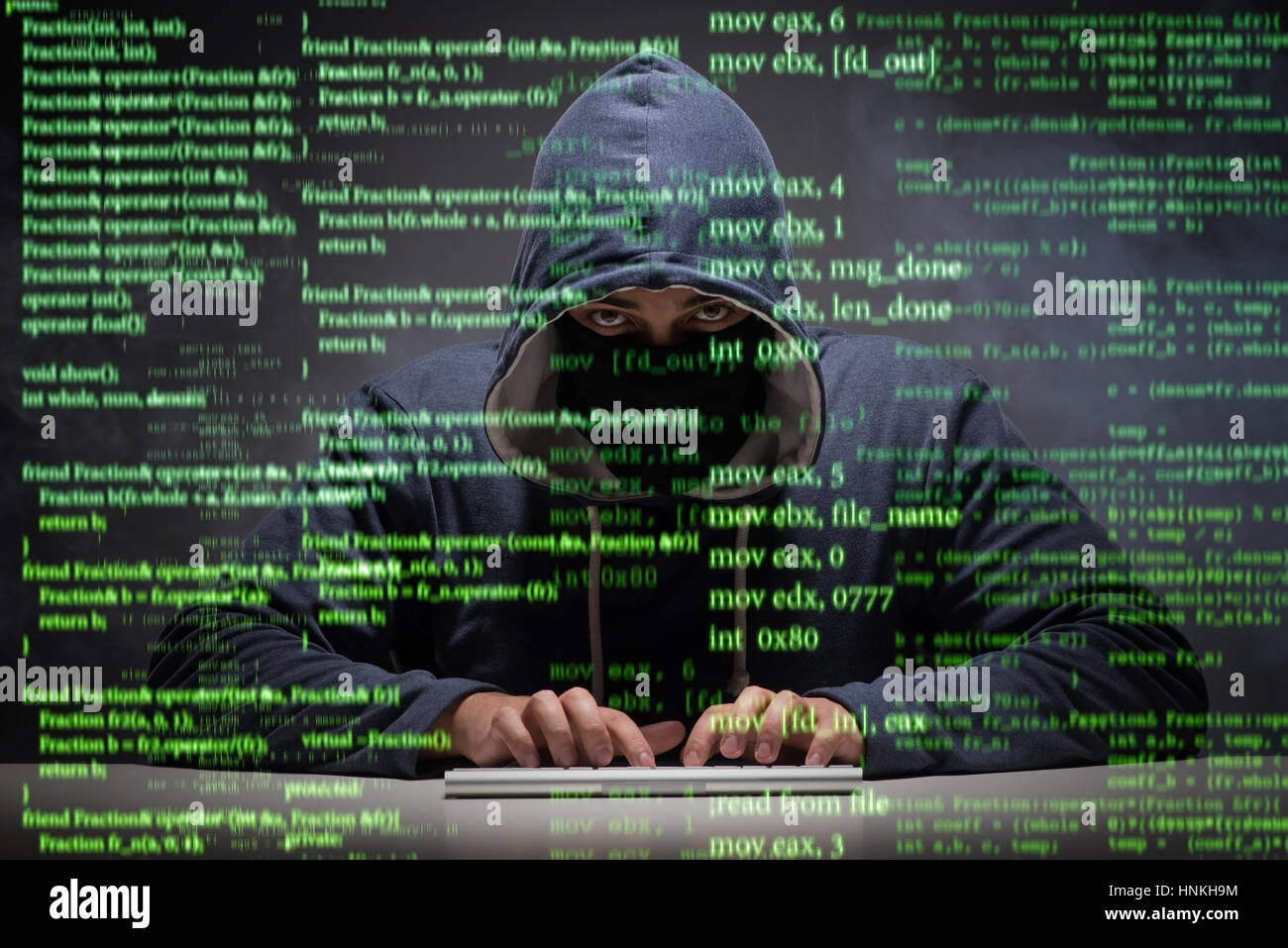 Young hacker in data security concept Stock Photo - Alamy