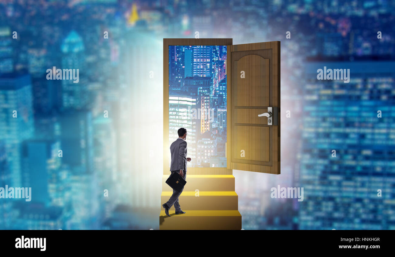 Businessman walking towards open door Stock Photo - Alamy