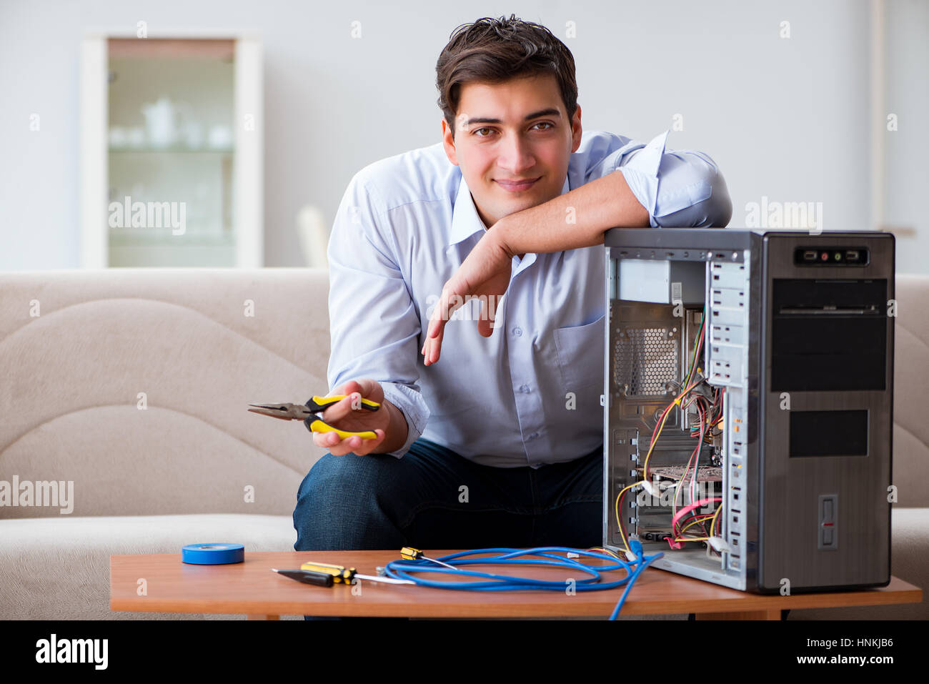 IT technician repairing broken pc desktop computer Stock Photo Alamy