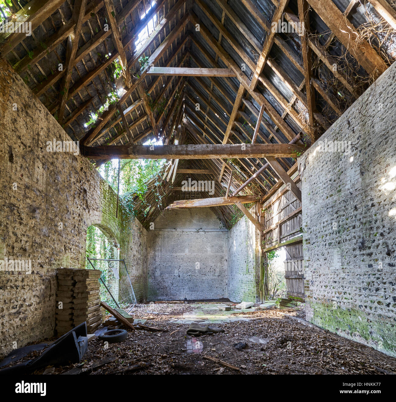 The Interior Of A Dilapidated Collapsing Old Barn Stock Photo